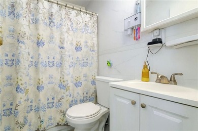 Introducing a distinguished three-family residence offering both - photo 12