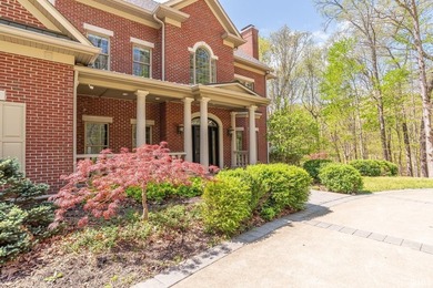 Enjoy the heirloom-quality finishes of this tasteful brick home - photo 3