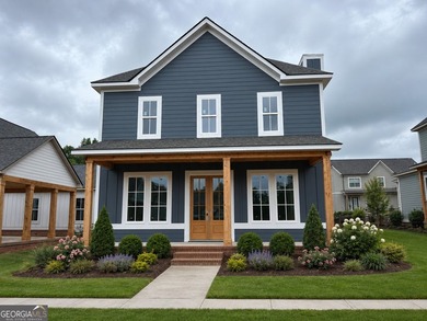 Welcome to this cottage-style planning community in the - photo 1
