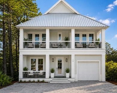 This incredible NEW CONSTRUCTION coastal home is located south - photo 2