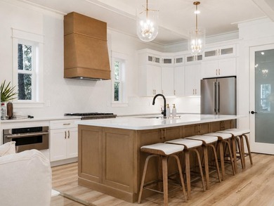 This incredible NEW CONSTRUCTION coastal home is located south - photo 8