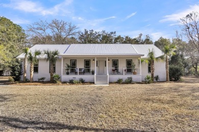 Lake Home For Sale in Ravenel, South Carolina