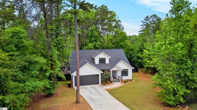 An oversized covered front porch with stained wood ceilings sets - photo 39