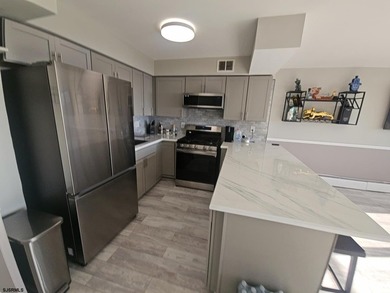 Experience elevated coastal living in this beautifully redone - photo 7