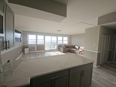 Experience elevated coastal living in this beautifully redone - photo 9