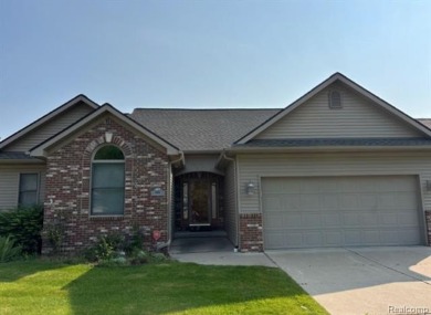Lake Condo Sale Pending in Burton, Michigan