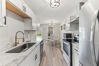 Fully renovated and move-in ready, this beautifully updated - photo 9
