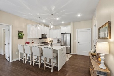 Luxurious condo living at an affordable price. Located on the - photo 8