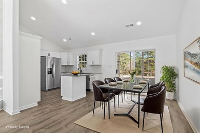 Price Improvement! Beautifully updated 3BR/2BA pond-front home - photo 8