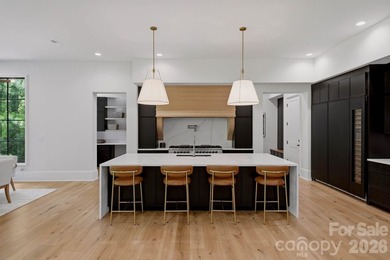 A landmark of luxury, sophistication, and craftsmanship, this - photo 11