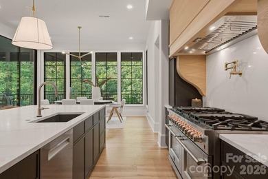 A landmark of luxury, sophistication, and craftsmanship, this - photo 14