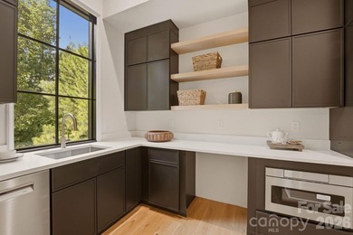 A landmark of luxury, sophistication, and craftsmanship, this - photo 16