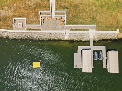 Luxury lakefront living reaches a new level in this magnificent - photo 3