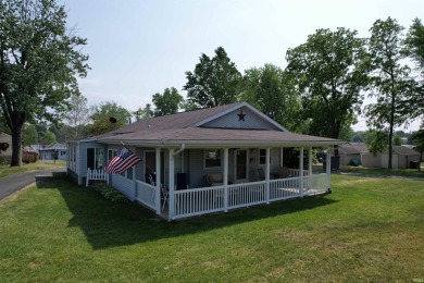 Lake living starts here! With a permanent boatlift at the - Lake Home For Sale in Monticello, Indiana