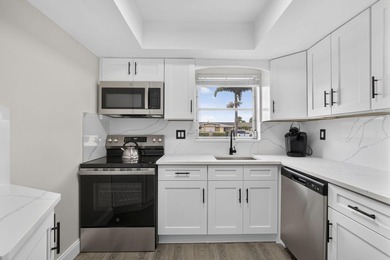 Welcome to this beautifully remodeled 2-bed, 2-bath villa - photo 16