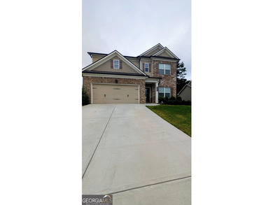 This spacious home features 5 bedrooms and 3 full bathrooms - photo 2