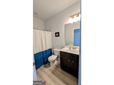 This spacious home features 5 bedrooms and 3 full bathrooms - photo 7