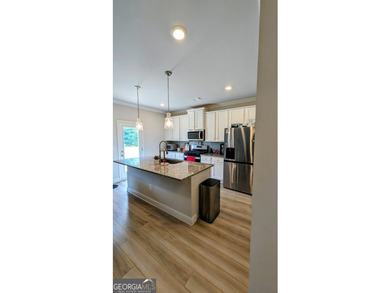 This spacious home features 5 bedrooms and 3 full bathrooms - photo 10