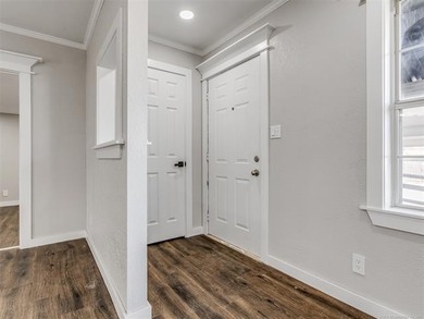 Completely remodeled and move-in ready! This charming