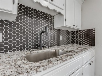 Completely remodeled and move-in ready! This charming