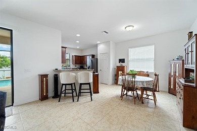 ONE OF THE LOWEST-PRICED POOL HOMES IN SW CAPE! Welcome to your - photo 14