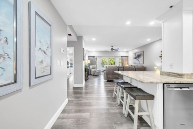 This gorgeous condo has been completely remodeled. Stunning open - photo 3