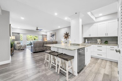 This gorgeous condo has been completely remodeled. Stunning open - photo 4