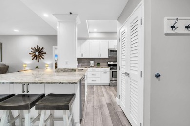 This gorgeous condo has been completely remodeled. Stunning open - photo 5