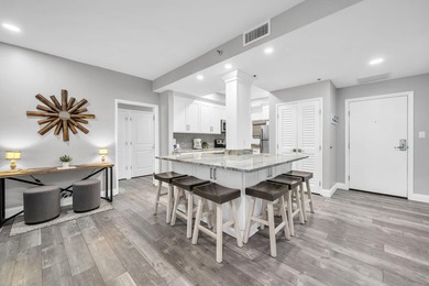 This gorgeous condo has been completely remodeled. Stunning open - photo 6