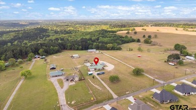 Situated on just over 4 acres in Lindale, this spacious property - photo 2