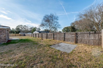 This home offers: 4/2, concrete block construction, ceramic tile - photo 13