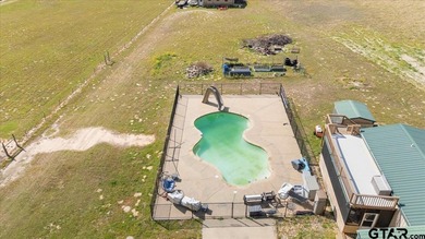 Situated on just over 4 acres in Lindale, this spacious property - photo 4