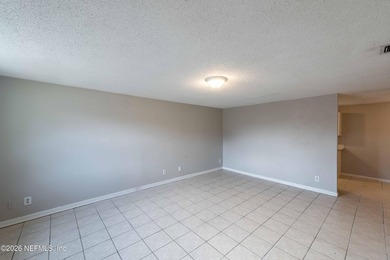 This home offers: 4/2, concrete block construction, ceramic tile - photo 15