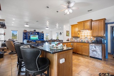 Situated on just over 4 acres in Lindale, this spacious property - photo 7