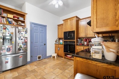 Situated on just over 4 acres in Lindale, this spacious property - photo 8