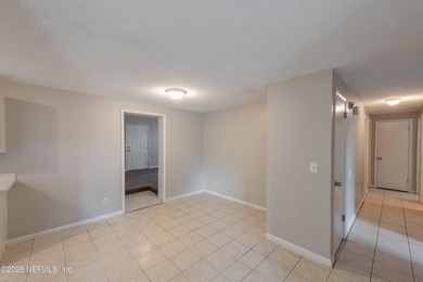 This home offers: 4/2, concrete block construction, ceramic tile - photo 19