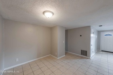 This home offers: 4/2, concrete block construction, ceramic tile - photo 20