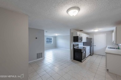 This home offers: 4/2, concrete block construction, ceramic tile - photo 21