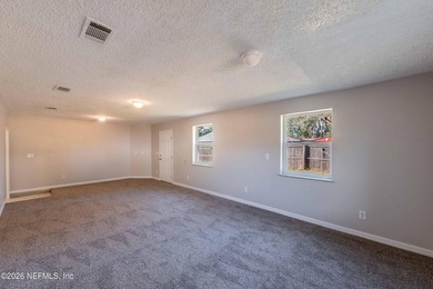 This home offers: 4/2, concrete block construction, ceramic tile - photo 29
