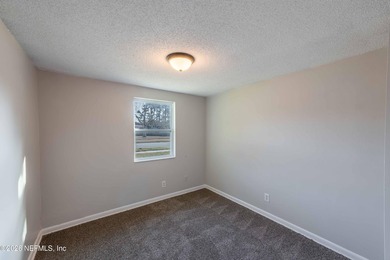 This home offers: 4/2, concrete block construction, ceramic tile - photo 30