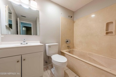 This home offers: 4/2, concrete block construction, ceramic tile - photo 32