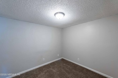 This home offers: 4/2, concrete block construction, ceramic tile - photo 34