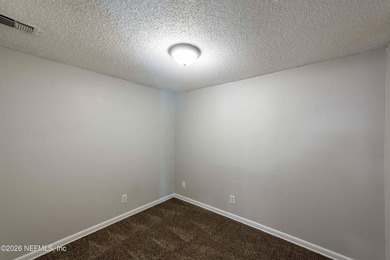 This home offers: 4/2, concrete block construction, ceramic tile - photo 37