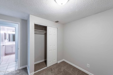 This home offers: 4/2, concrete block construction, ceramic tile - photo 38