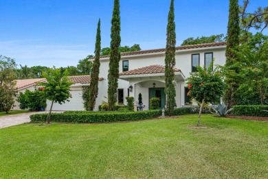 Lake Home For Sale in Palm Beach Gardens, Florida
