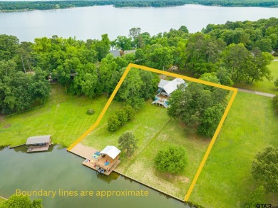 This lakefront home is an idyllic retreat for anyone seeking - Lake Home For Sale in Pittsburg, Texas