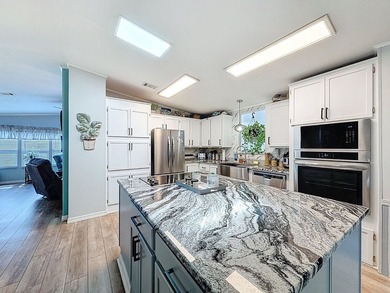 OWN YOUR OWN LAND IN THIS SOUGHT-AFTER RESORT-STYLE 55+ GATED - photo 12