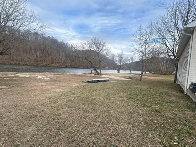 Enjoy nearly an acre of level waterfront property where the - photo 9