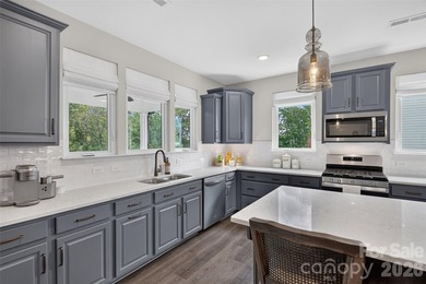 Perfectly positioned with breathtaking lake views and - photo 7