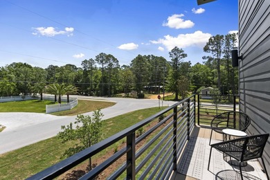 Discover modern coastal living at 30 North Townhomes, a - photo 10